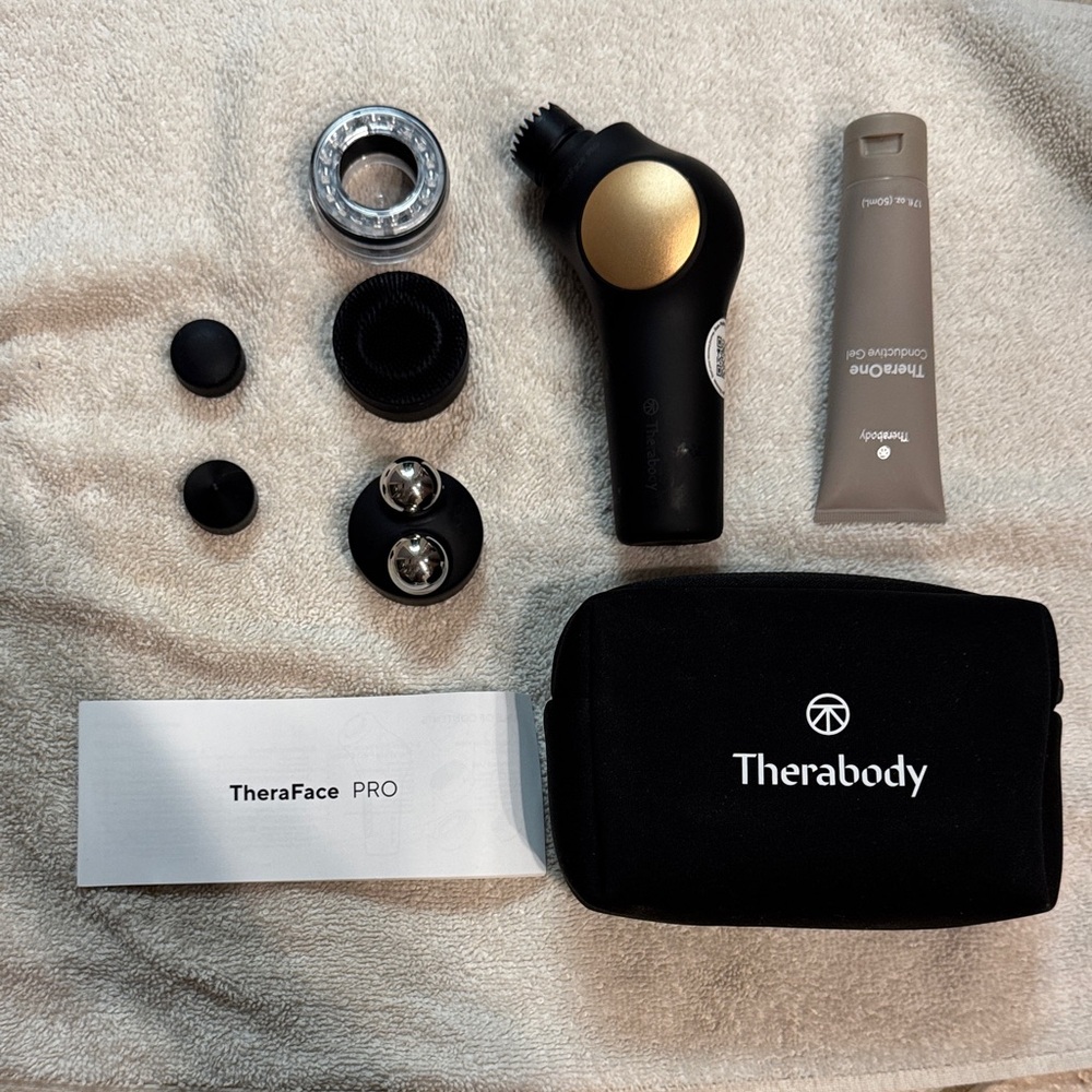 Therabody Theraface Pro Black and Gold Skincare Device